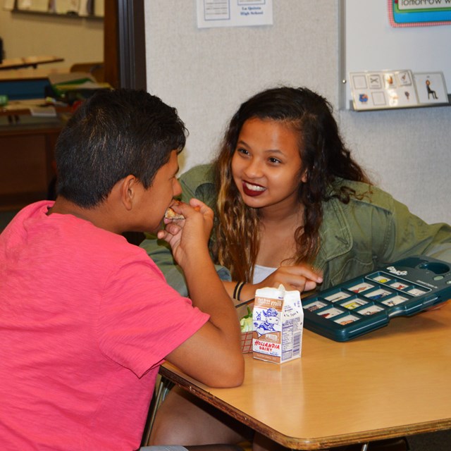 Students eating and talking