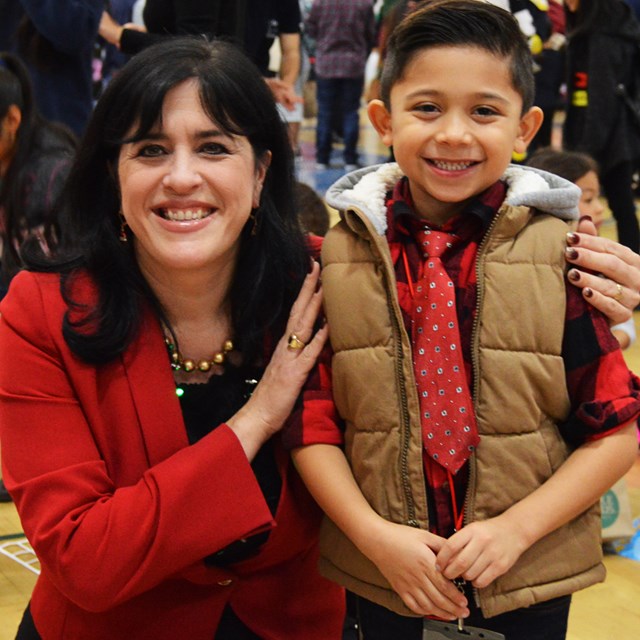 Superintendent Gabriela Mafi and a student